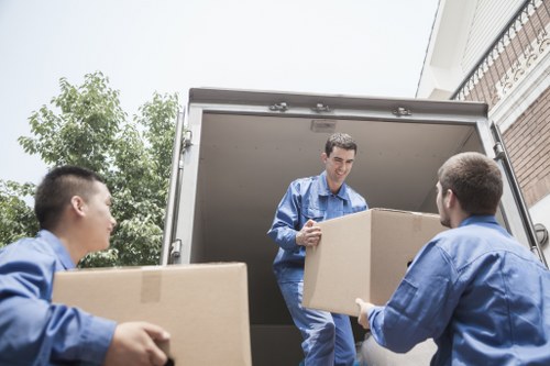 Loading household items into a van in Bermondsey