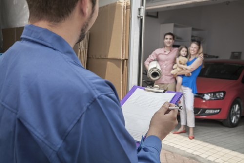Careful loading of boxes and furniture into a van