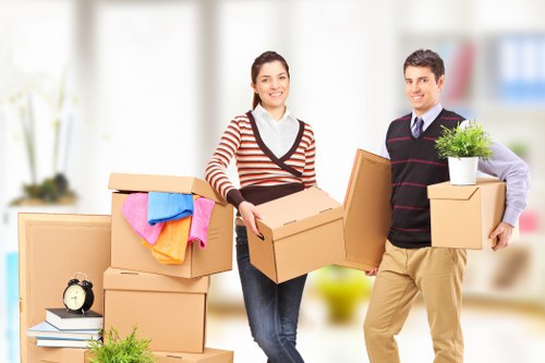 Careful unloading of household furniture at a Bermondsey property