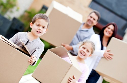 Movers handling household items during a scheduled relocation