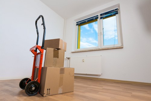 Removal van outside a Bermondsey apartment building during a local move