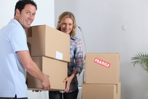 Household items and boxes being unloaded at a Bermondsey property